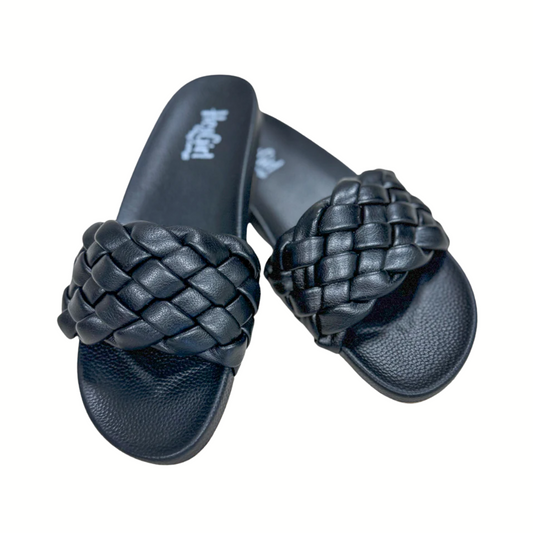 The CORKYS Extra Sandal in Black by CORKY'S FOOTWEAR INC features thick black braided straps, a cushioned footbed, and textured soles, shown on a white background.