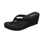The FLOJOS Flojos Olivia Wedge Flip Flop in Black features a thick sole, thong-style straps, and a cushioned footbed for all-day comfort.