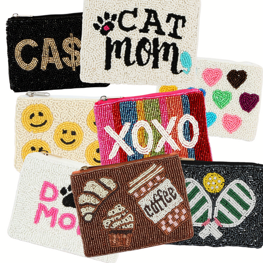 The Seed Bead Accented Mini Pouch Bag Assorted by Wona Trading features fun designs and sayings like "CAT MOM," "XOXO," "CA$H," emojis, hearts, pastries, and tennis rackets—an ideal gift for any fashion lover.