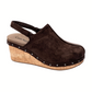 Brown faux suede clogs with a cork wedge heel, slingback strap, and metal studs along the sole—discover the Make Em Blush Wedge Clog by CORKY'S FOOTWEAR INC.