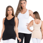 Three women model FASHION GO's Reversible V or U Neckline Seamless Tank in black, white, and beige, crafted from buttery soft fabric with a fitted silhouette. Two face forward while the third reveals the elegant back, all paired with crisp white pants.
