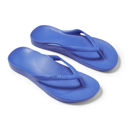A pair of Archies flip flops in Capri Blue by ARCHIES FOOTWEAR LLC, featuring textured footbeds and simple thong straps, made from closed cell foam that molds to your shape, displayed on a white background.
