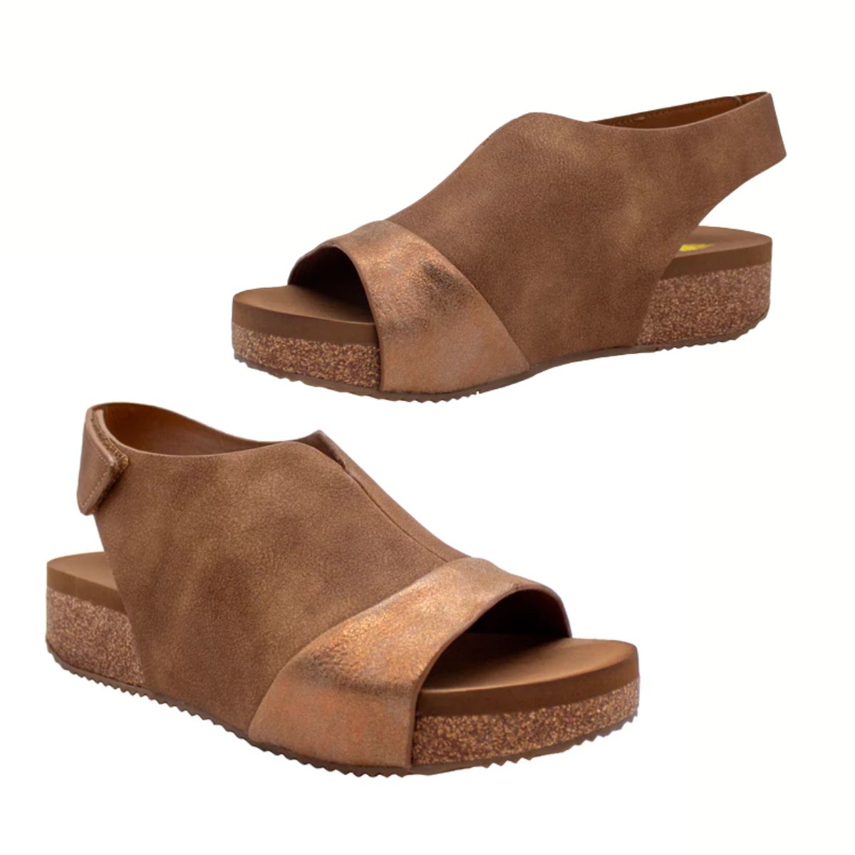 A pair of brown Volatile Aurelia Open Toe Low Wedge sandals with a thick sole, cushioned insole, matte finish, cork-textured platform, and a secure slingback strap.