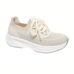 The Stride-1 Sneaker by OLEM SHOE CORP features a comfortable beige knit, white laces, and a thick white rubber sole—ideal for casual wear and shown against a white background.