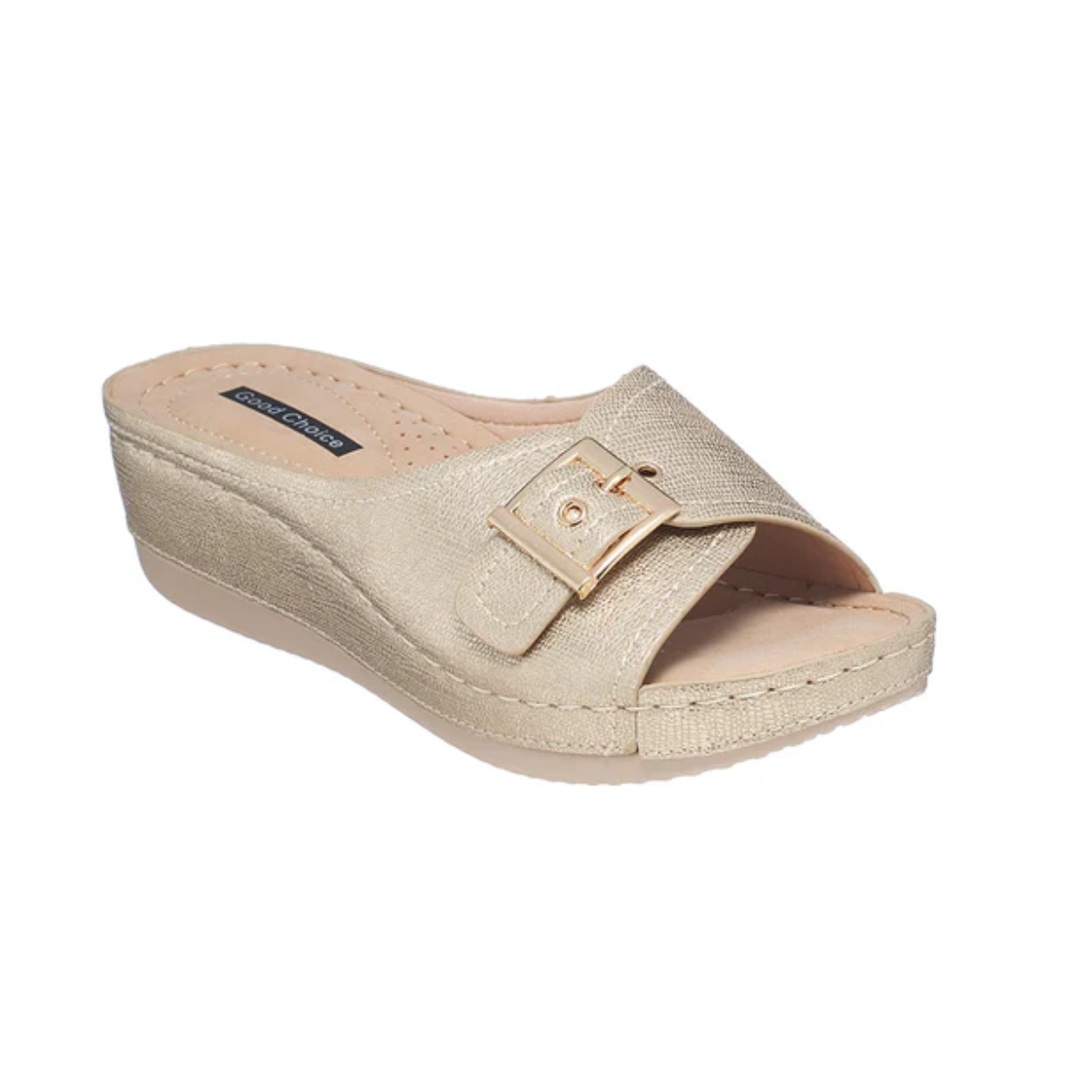 The Justina Slide Comfort Sandal by Good Choice is a beige faux leather wedge with a textured strap, gold buckle detail, open toe design, and cushioned footbed for all-day comfort.