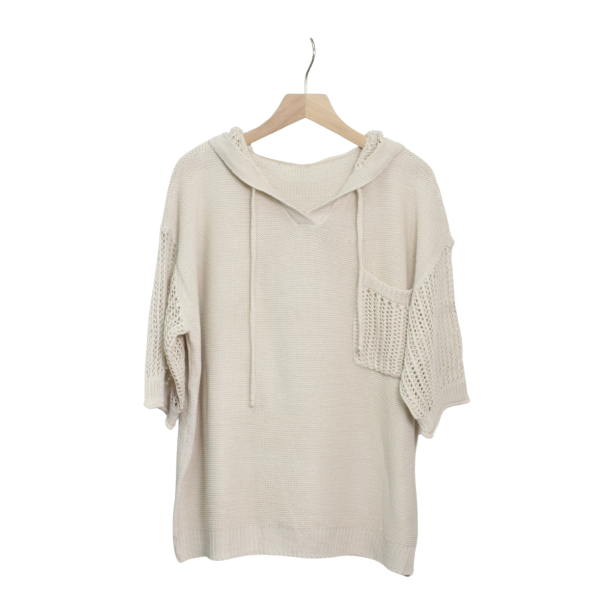 A beige Hoodie Knit Top from FASHION GO with dropped shoulders, short sleeves, and a front pocket, hanging on a wooden hanger against a white background.