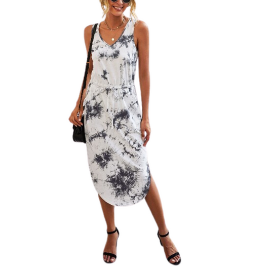 Woman wearing a FASHION GO V Neck Print Sleeveless Midi Dress with a black and white pattern, black sandals, a black handbag, and a necklace—a perfect ensemble for summer fashion.