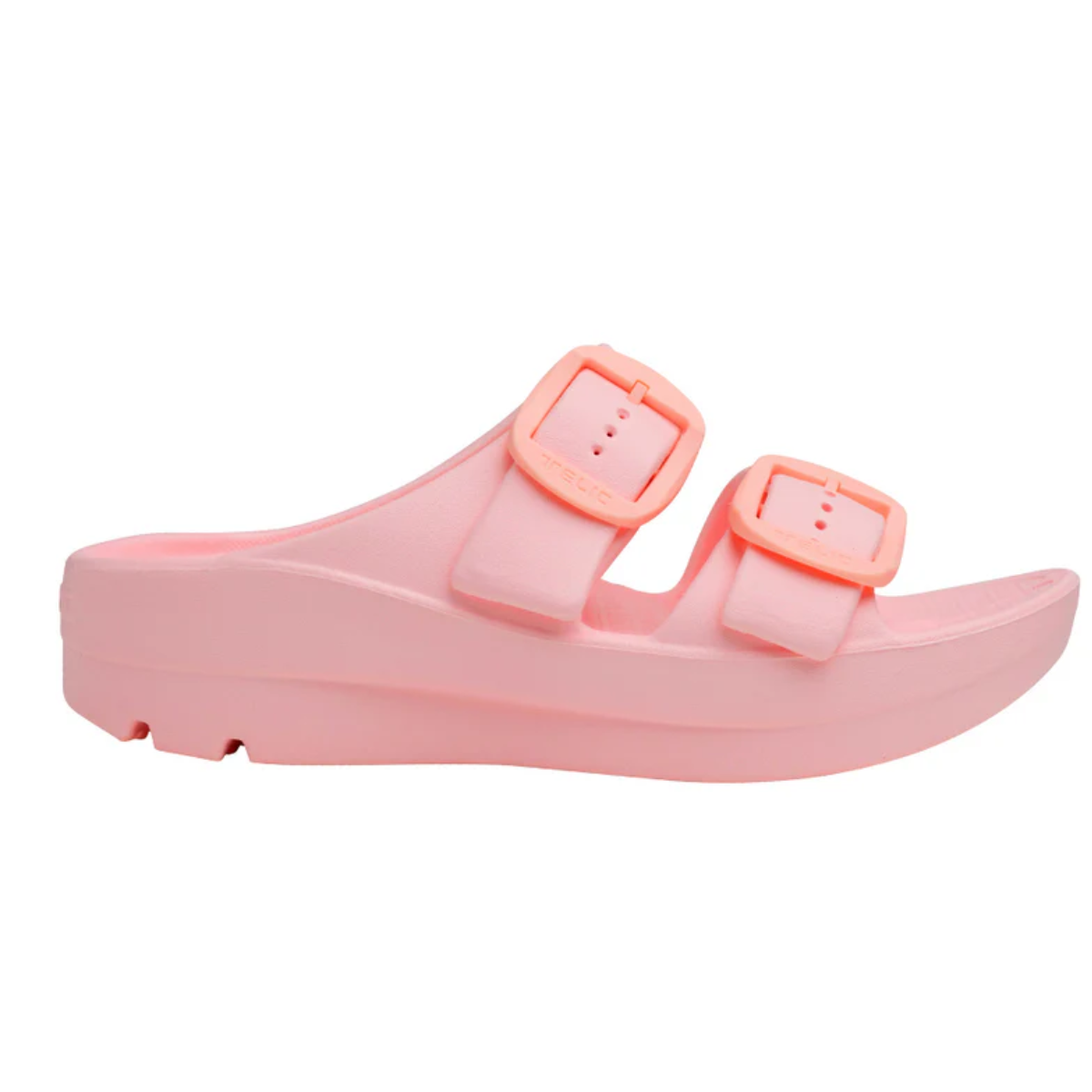 A pink slip-on sandal with two adjustable buckle straps, a slight platform heel, and an anatomically correct footbed for arch support is the Boise Bliss in Rose Quartz by Telic from TELIC.