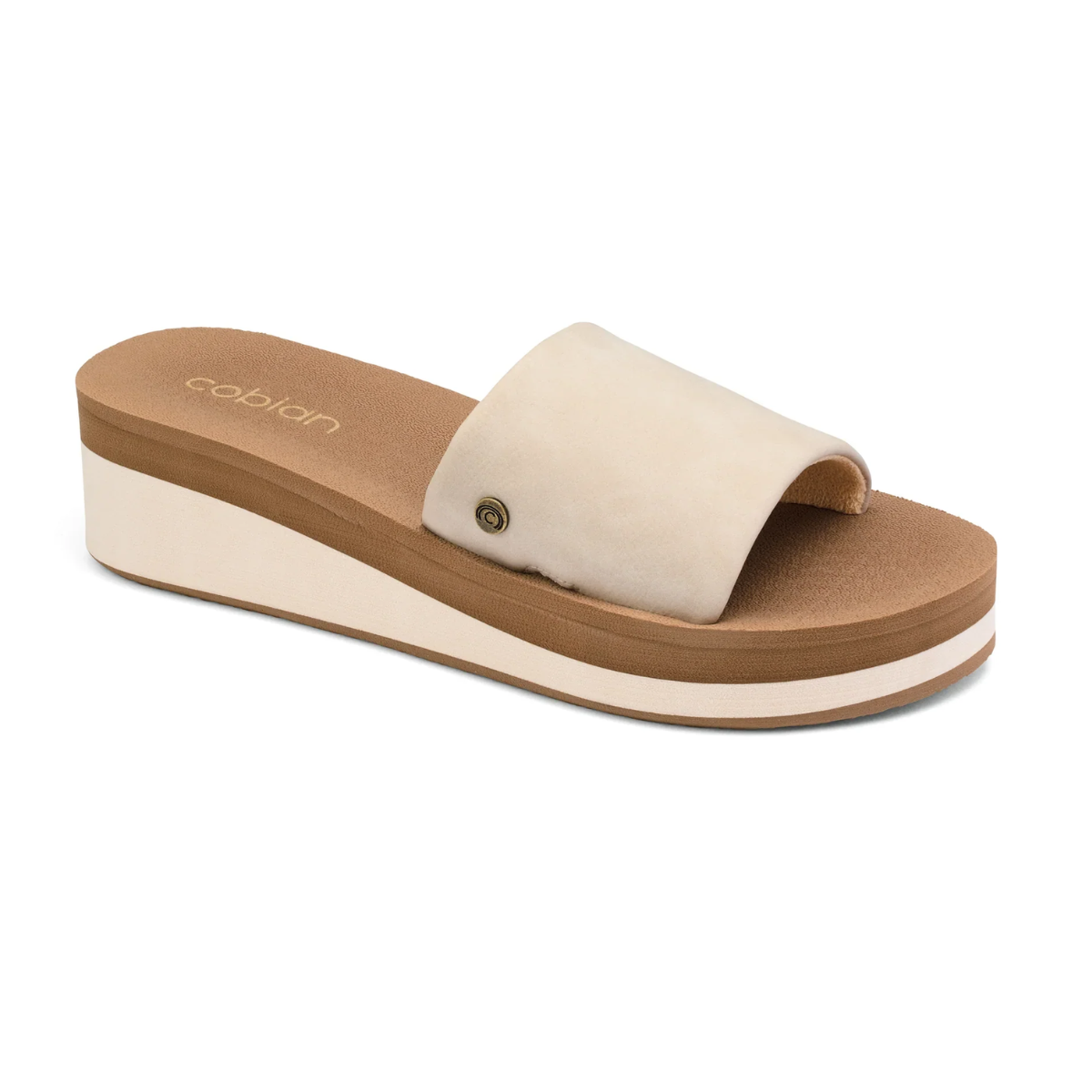 The Seville Wedge Slide in Taupe by COBIAN boasts a thick sole and a wide, single upper strap. The cushioned top sole provides anatomical arch support and is adorned with the Cobian logo on the insole. Main image