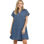 A woman wears the Umgee Chambray Button-Front Shirt Dress with short sleeves and an A-line silhouette, posed against a plain white background.