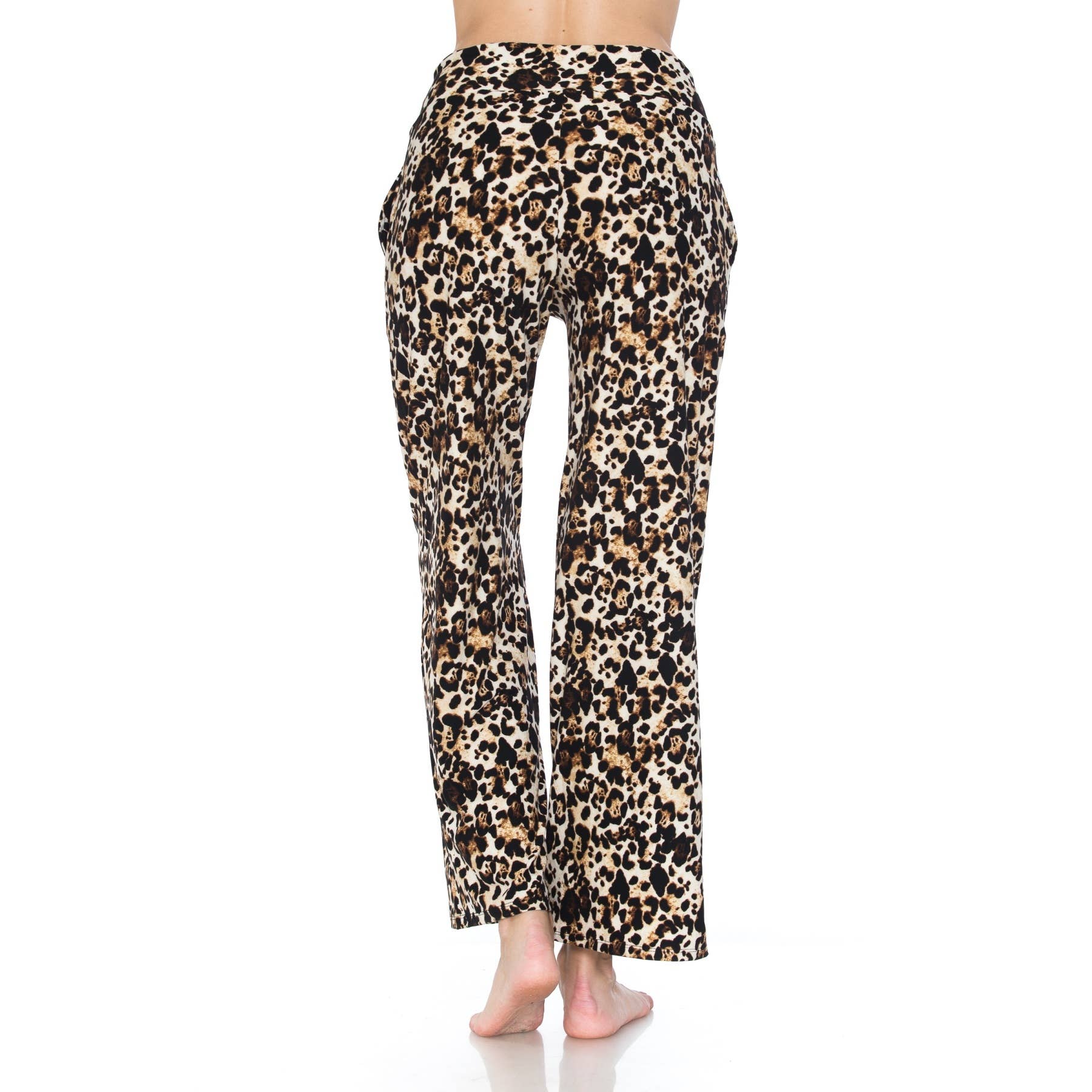 A person stands barefoot facing away, wearing Leggings Depot Buttery Soft Print Pajama Pants featuring a high-waisted, straight-leg fit and brown, black, and beige leopard print with an elastic waistband against a white background.