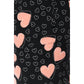 Leggings Depot Buttery Soft Pajama Pants feature black fabric with large pink hearts and small white outlined hearts, plus an elastic waistband for ultimate comfort.