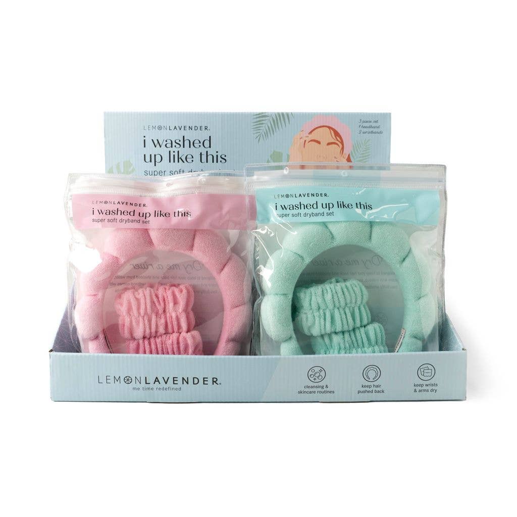 Two I Washed Up Like This Super Soft Dryband Set packages, each containing an absorbent terrycloth headband and two wristbands for washing faces, in light pink and light green.