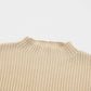 The Shewin Patch Pocket Ribbed Knit Short Sleeve Sweater in beige, ideal for transitional weather with its crew neckline, is displayed flat on a white background.