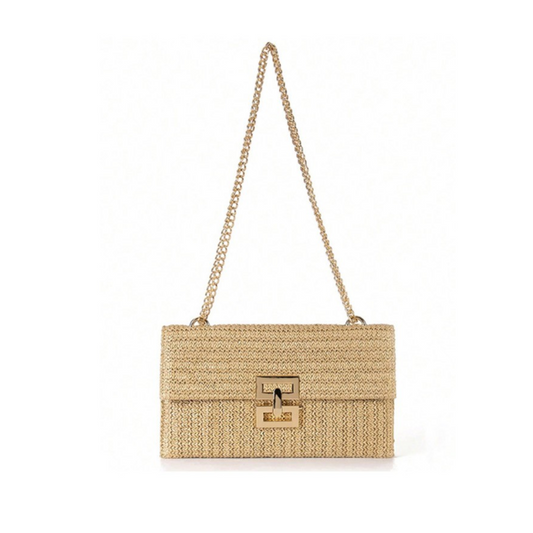 A beige woven handbag with a single flap design, featuring a gold chain strap and a rectangular gold clasp in the center—perfect for stylish spring/summer outings. The Zoey Clutch by FASHION GO adds a chic touch to any outfit.