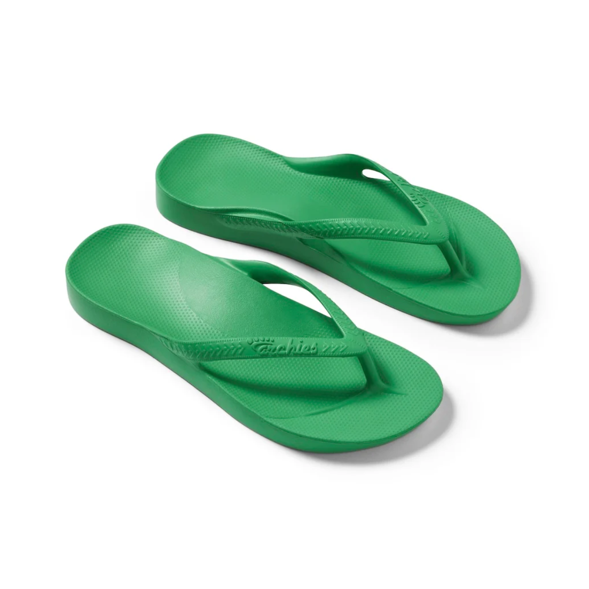 A pair of Archies Flip Flops in Green with a textured footbed and thong straps, made from comfortable closed cell foam by ARCHIES FOOTWEAR LLC.