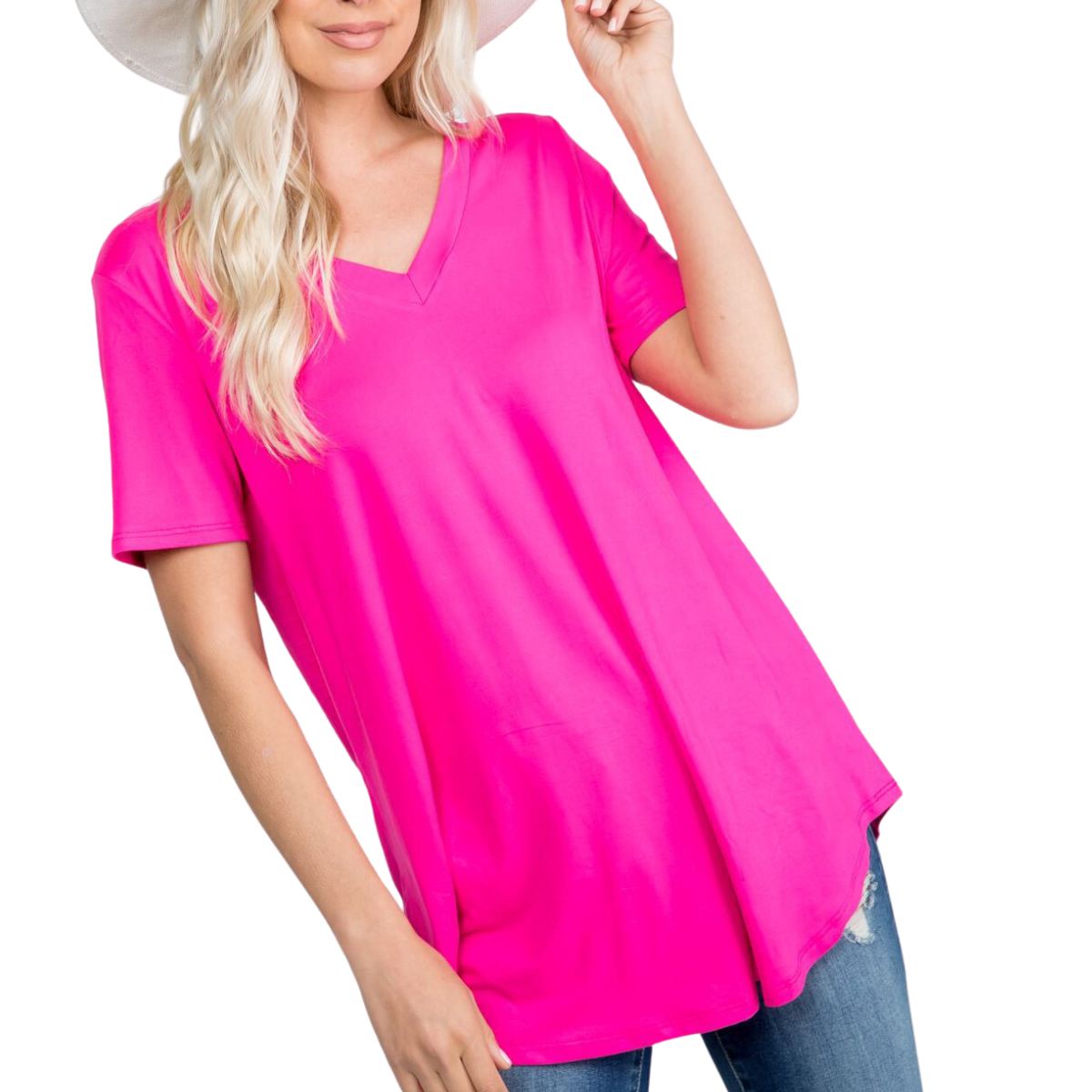 Person wearing a bright pink, FASHION GO Butter Soft Solid Basic T, blue jeans, and a white hat against a white background. Main image