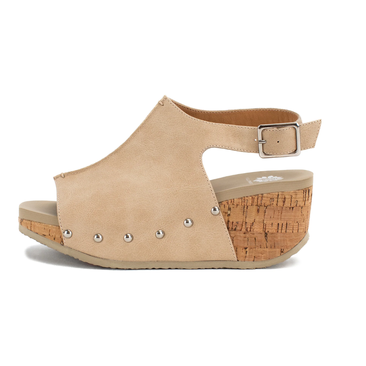 Capella Wedge Heel in Ivory by Yellow Box with a cork sole, open toe, and ankle strap. Crafted from faux leather, it features silver rivet detailing on the side.