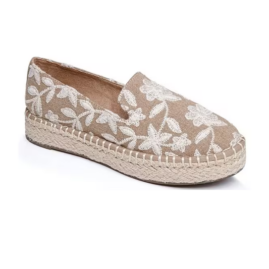 A single Cayce-12 Embroidered Loafer in Beige by Me Too with white floral embroidery, a woven espadrille-style sole, and a comfortable memory foam insole.