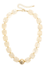 Palermo Resin Beaded Necklace featuring cream-colored square beads, a single gold-tone spherical center bead, and a gold-tone lobster clasp closure.