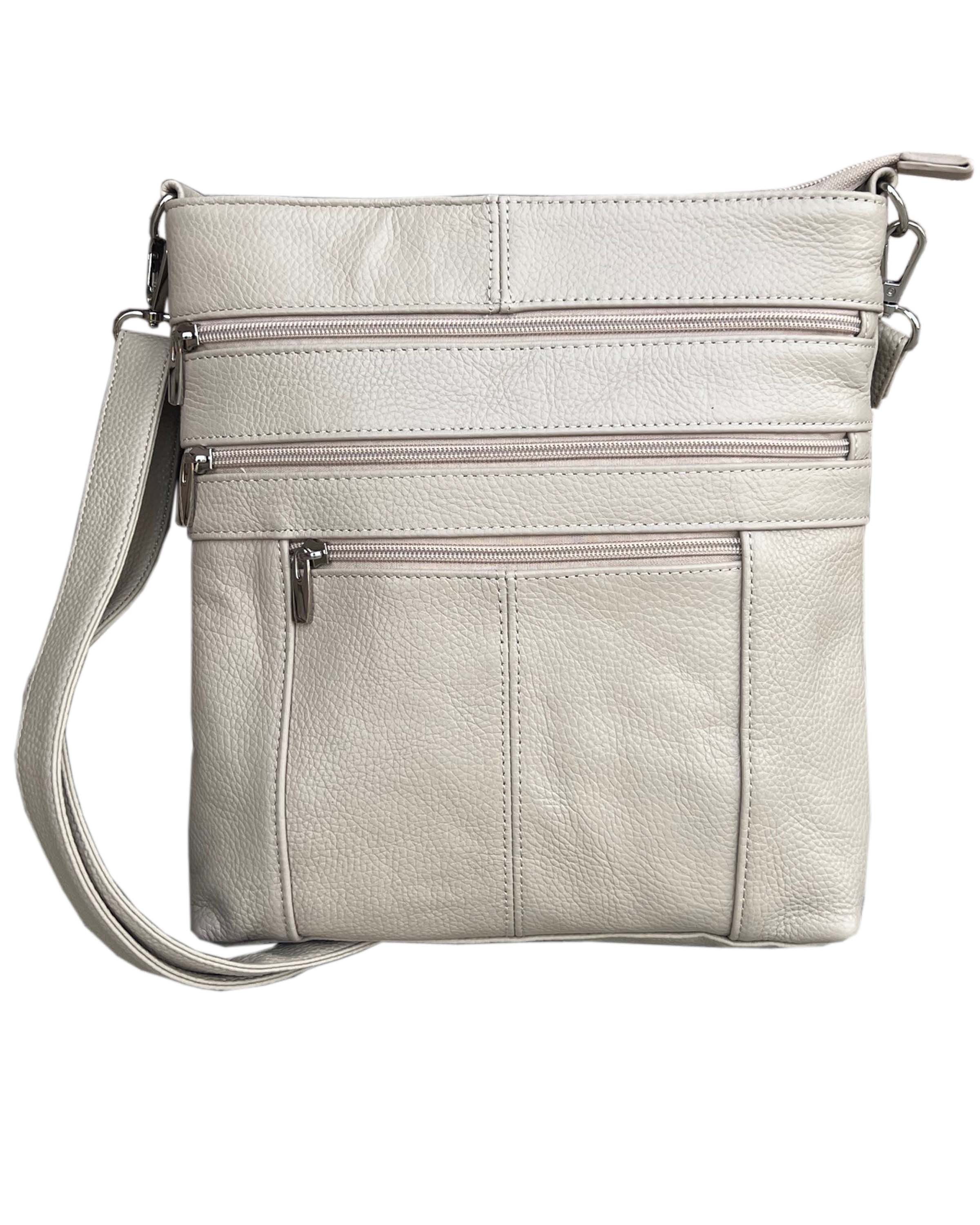 Roma Leathers, Inc. Cowhide leather crossbody bag with adjustable strap features light gray leather, two front zippered pockets, and is displayed against a white background.