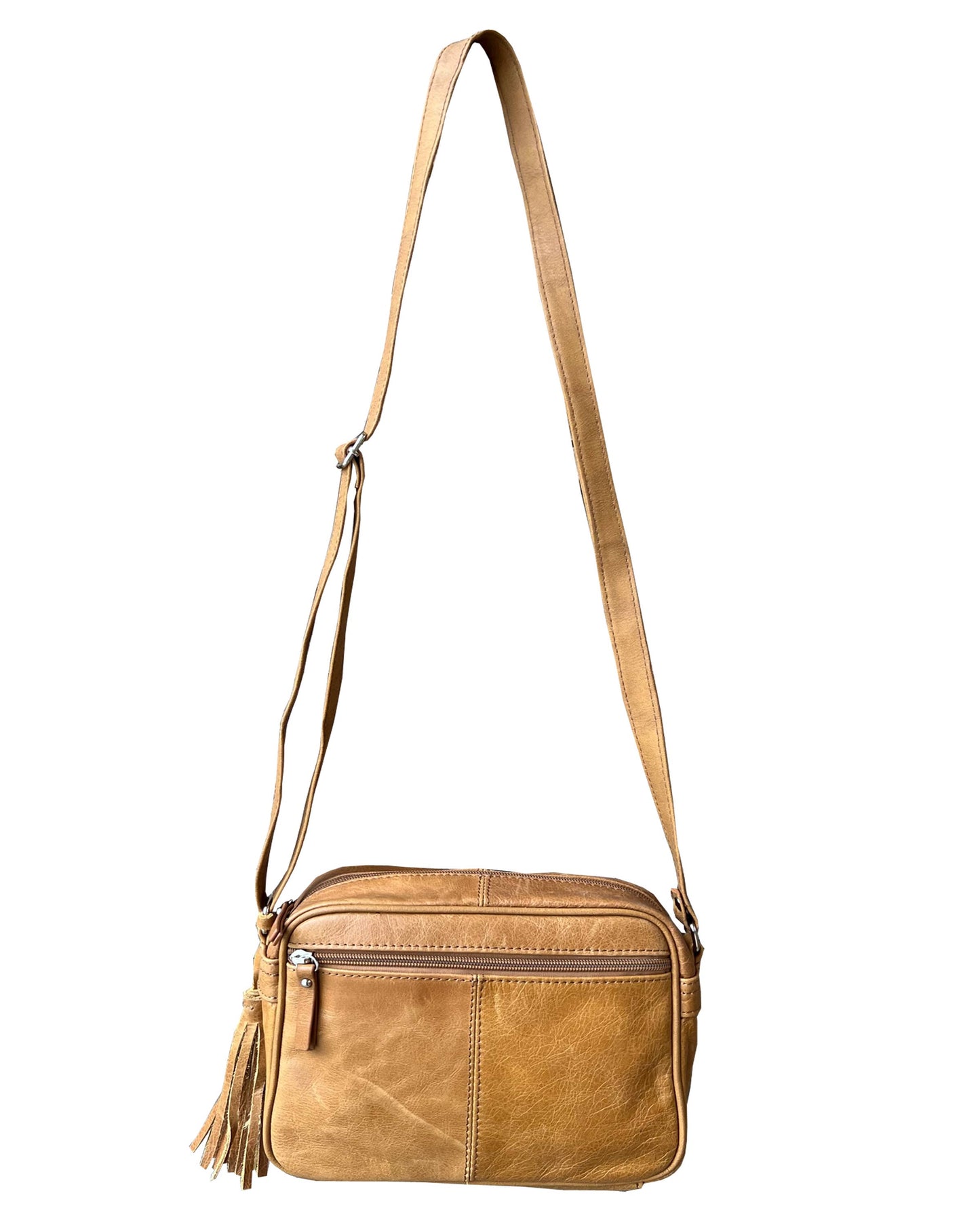 The Roma Leathers, Inc. Cowhide Leather Crossbody features tan cowhide leather, an adjustable shoulder strap, a front zipper pocket, and a decorative side tassel, shown against a white background.