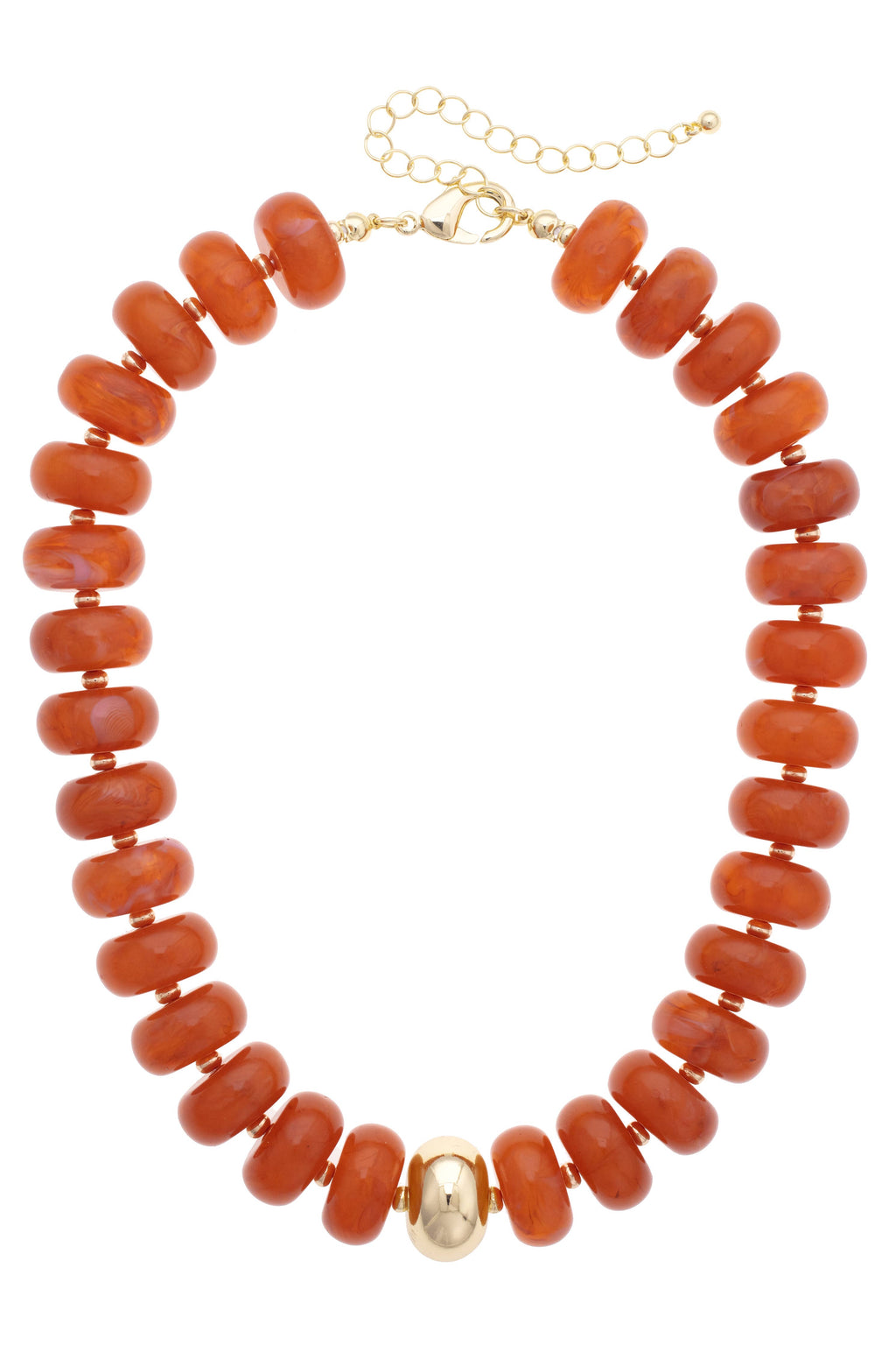 The San Sebastián Beaded Resin Necklace by Canvas Style features chunky orange resin beads with a single large gold bead at the center and a gold adjustable chain clasp. This statement necklace adds a vibrant touch to any look.