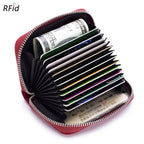 The ACCITY CARD WALLET Anti-Theft Wallet is open, showing neatly organized cards, a rolled U.S. dollar bill, and various paper items inside.