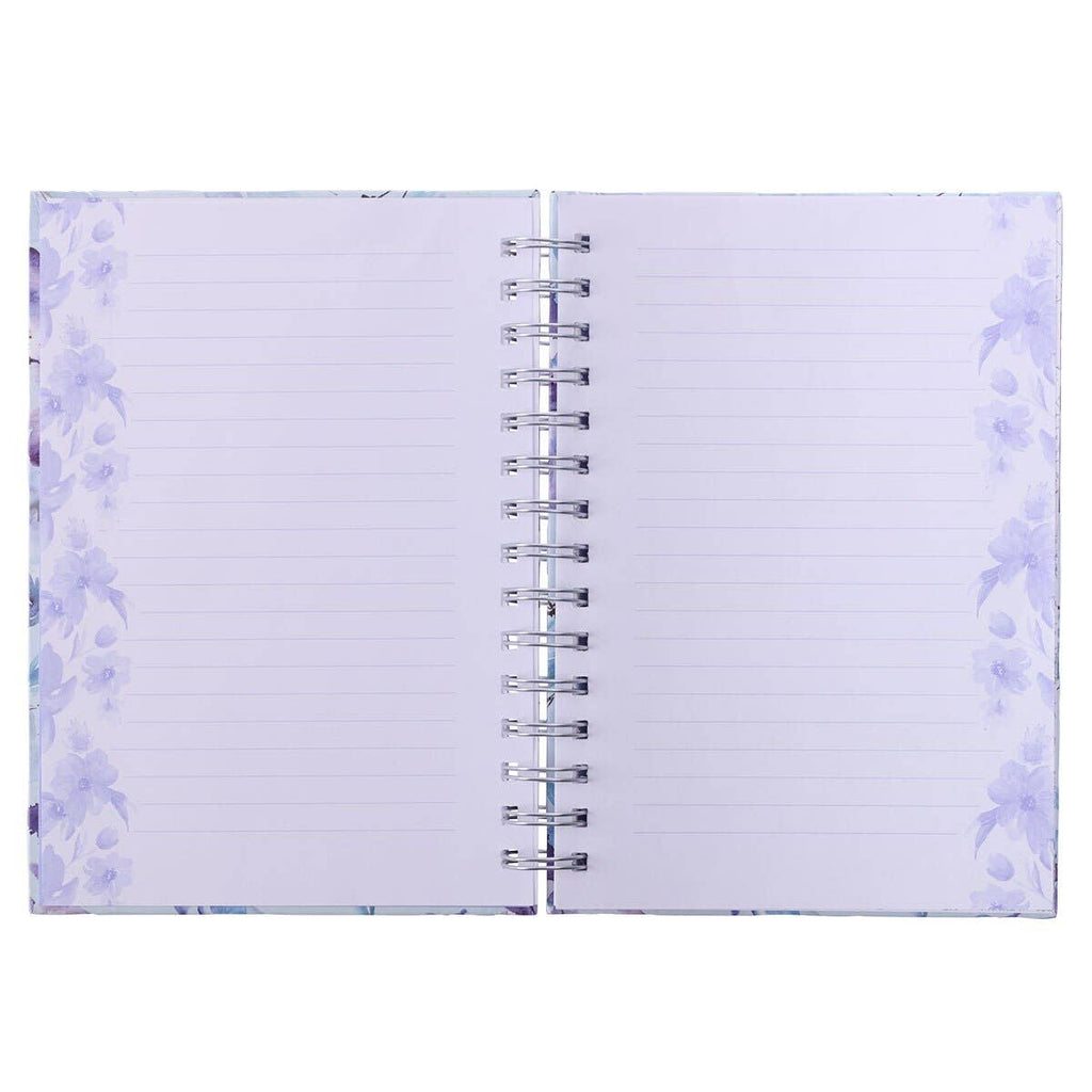 Open spiral-bound notebook with lined pages and a soft floral border, shown from above—a charming "Journal Wirebound It is Well with My Soul" by Christian Art Gifts, perfect for capturing your thoughts.
