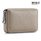 The ACCITY CARD WALLET Anti-Theft Wallet features beige textured leather, a zippered closure, and an RFID protected label in the top right corner.