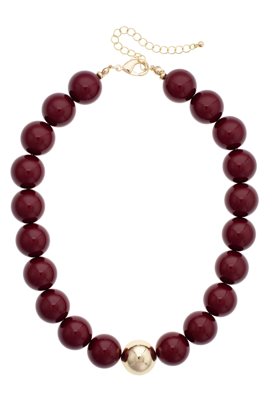The Marjorie Game Day Beaded Necklace from Canvas Style features oversized burgundy beads accented by a single central gold bead, finished with a gold chain and clasp for adjustable length—a bold statement necklace designed to elevate any outfit.