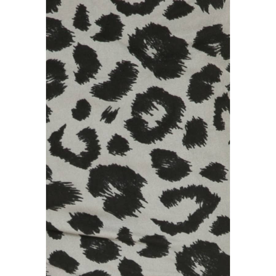 Close-up of Leggings Depot's Buttery Soft Print PJ Pants, featuring a black and white leopard print pattern—ideal for cozy, comfortable pajamas.