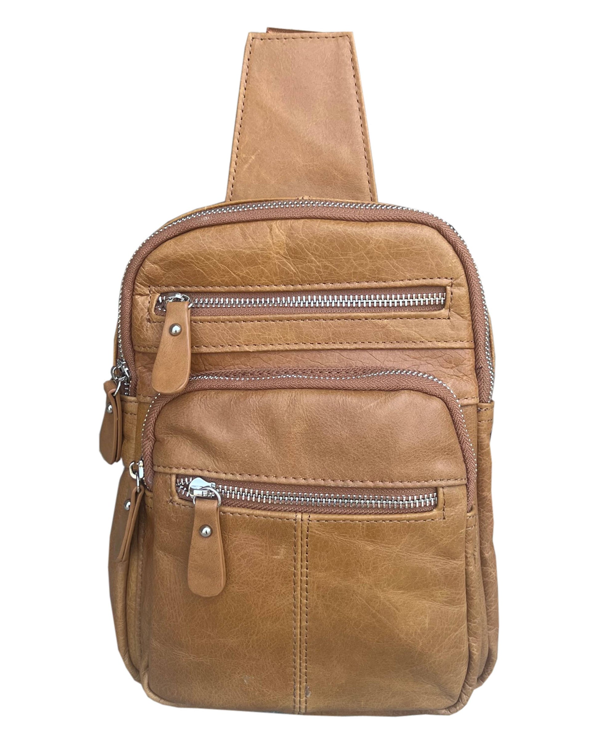 The Roma Leathers, Inc. cowhide leather sling bag backpack features three front zippered pockets and an adjustable shoulder strap, shown against a white background.