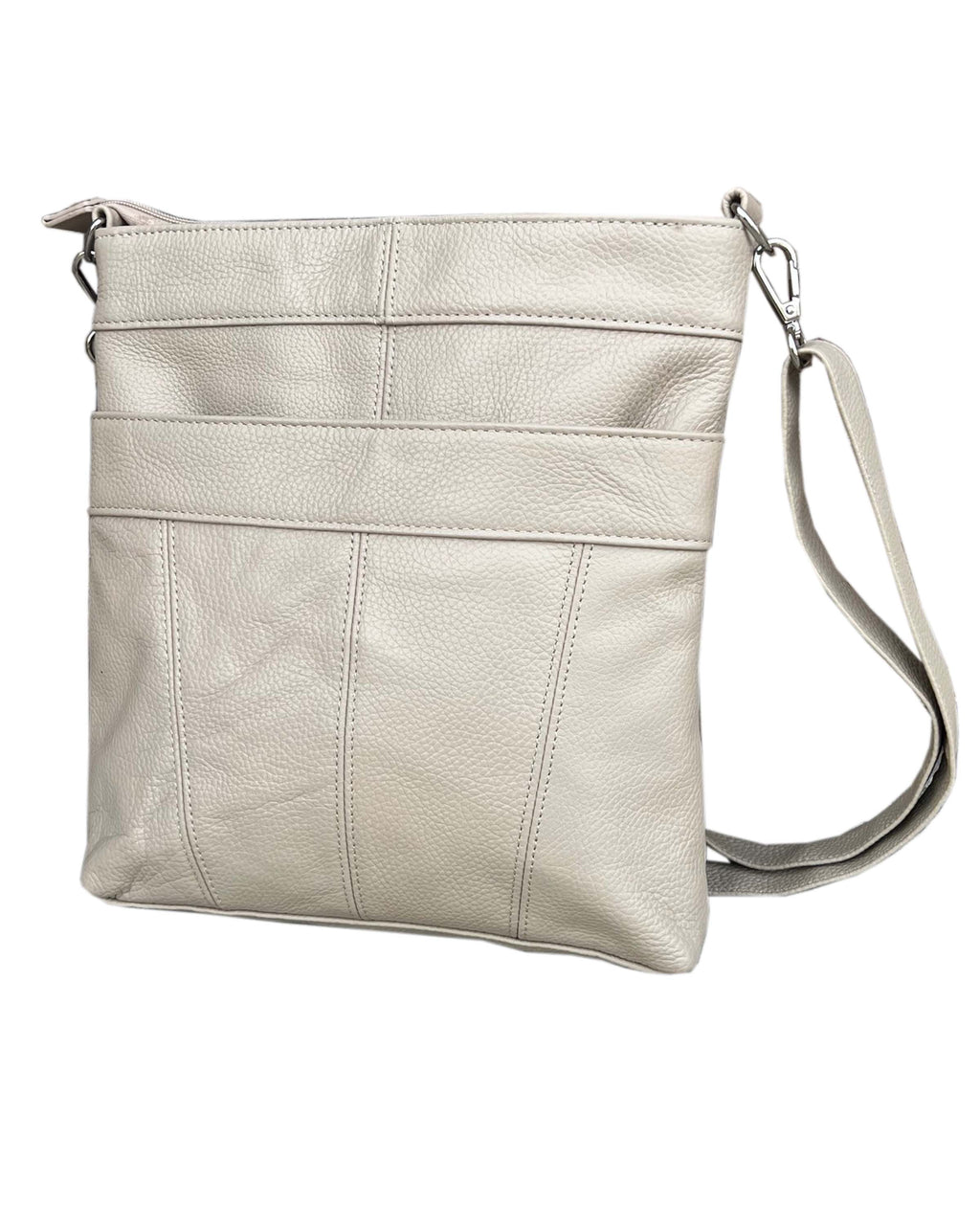 The Roma Leathers, Inc. cowhide leather crossbody bag features a long adjustable strap, vertical stitching, and secure zippered top pockets for storage.