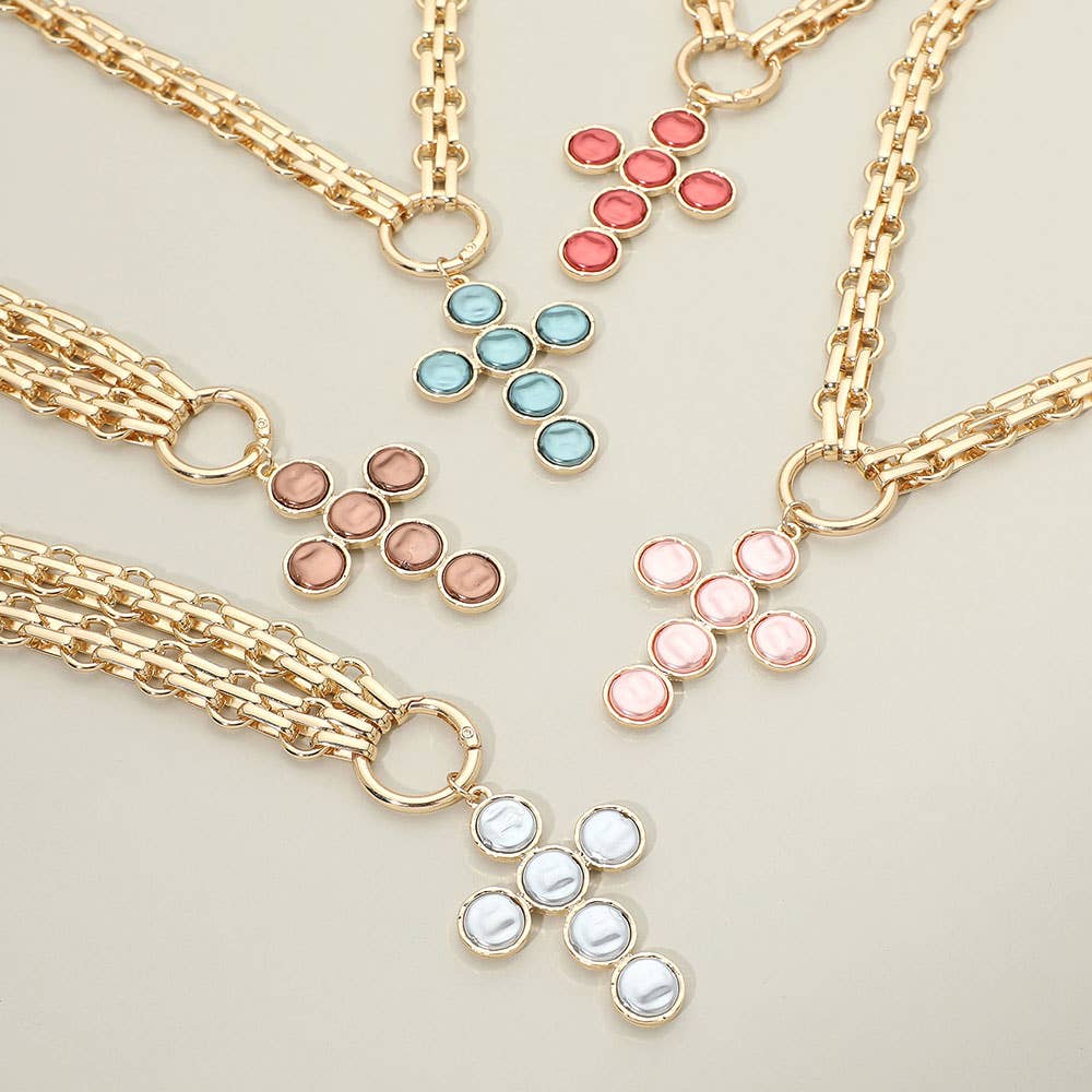 Five Sensibling Corp. Pearl Cross Charm Pendant Chunky Chain Statement Necklaces are displayed on a neutral background, each showcasing an elegant cross pendant adorned with five round colored stones—pink, blue, white, brown, and red—that highlight the unique textured design of these eye-catching statement pieces.