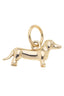 The Canvas Style Dachshund Dog Charm in Shiny Gold is a delightful dachshund-shaped pendant featuring a top loop for easy attachment to your favorite chain, making it an ideal accessory for dog lovers. Displayed against a white background.