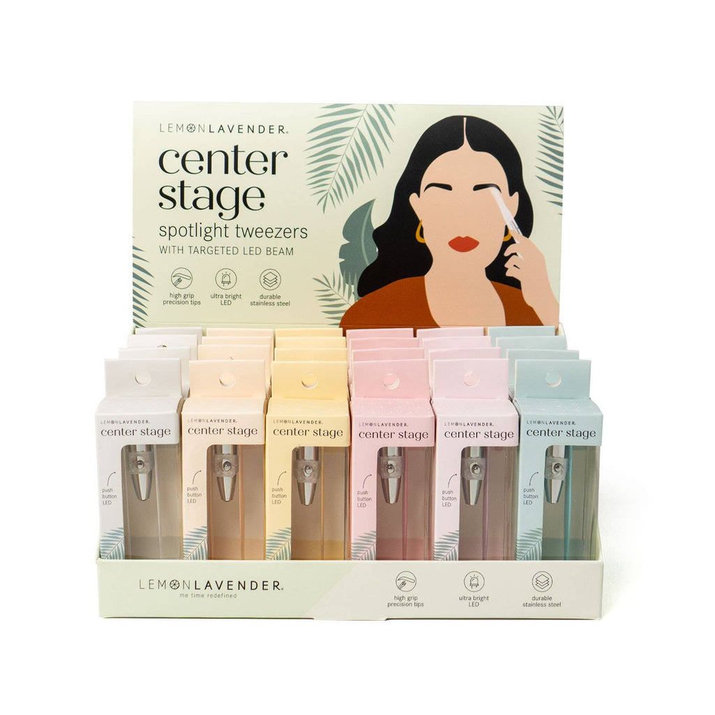 Counter display box filled with pastel-colored boxes of Lemon Lavender Light Up Tweezer LED spotlight tweezers, each featuring a precision grip.