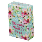 A small rectangular Box of Blessings Blessings for a Woman’s Heart with a light blue background, decorated with a pink and white floral pattern and the text “Blessings for a Woman’s Heart.”