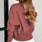 A woman with long, wavy hair stands sideways wearing a high-quality Shewin Gray Zip Up Stand Collar Ribbed Thumbhole Sleeve Sweatshirt and white shorts.