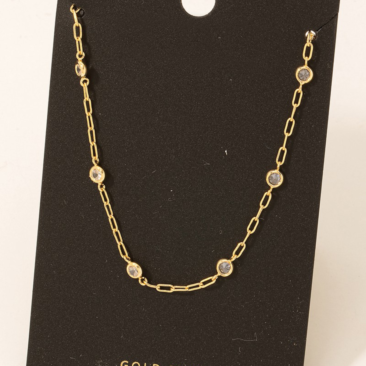 FASHION GO Gold Dipped Rhinestone Necklace with circular diamond accents displayed on a black background. Main image