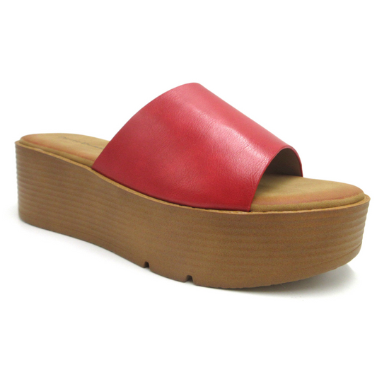 A comfortable fit red platform slide sandal with a wooden sole by OLEM SHOE CORP - Aster in Red by Pierre Dumas.