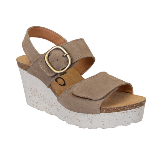 A women's Peasant in Greige by OTBT boho style wedge sandal with a buckle closure and a platform sole by Consolidated Shoe Co.