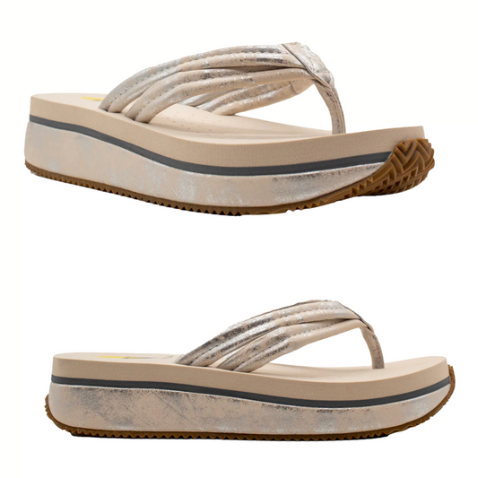 A pair of Volatile - Rosenthal & Rosenthal Stargazer Metallic Padded Strap Flip Flop in Silver featuring a comfort EVA insole.