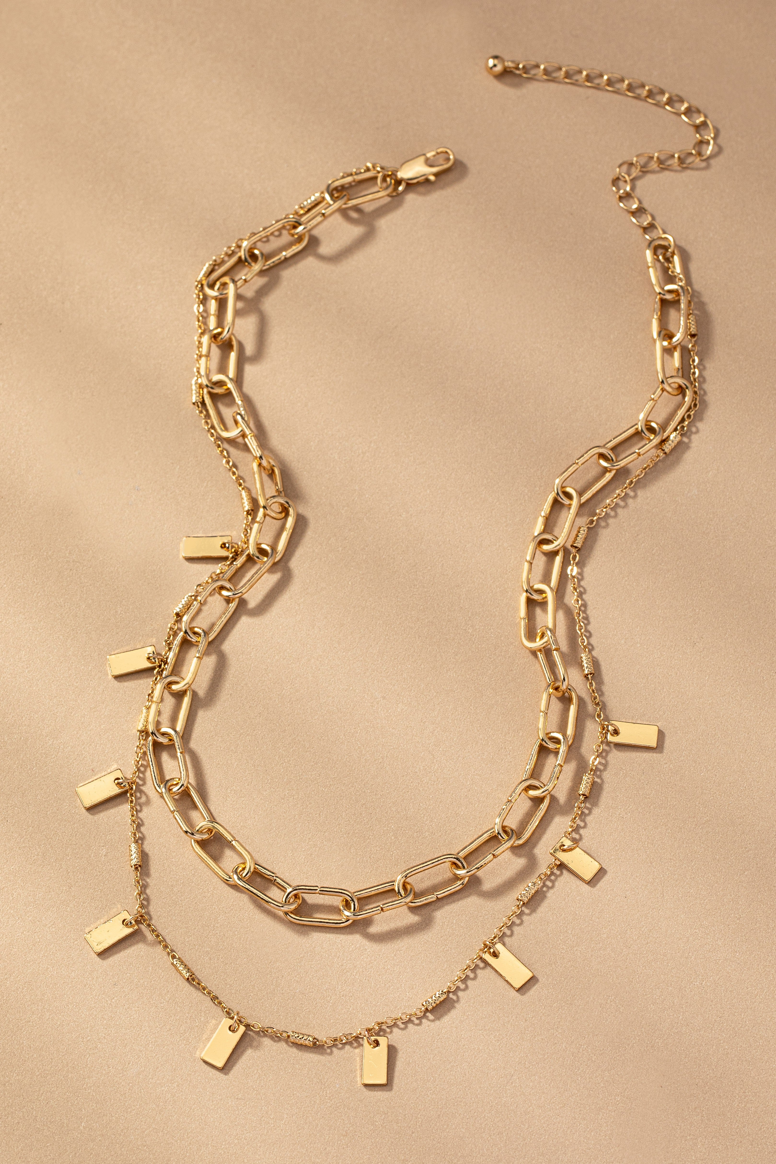 Two Row Chunky Chain with Rectangular Drops by FASHION GO, displayed on a beige background. Main image