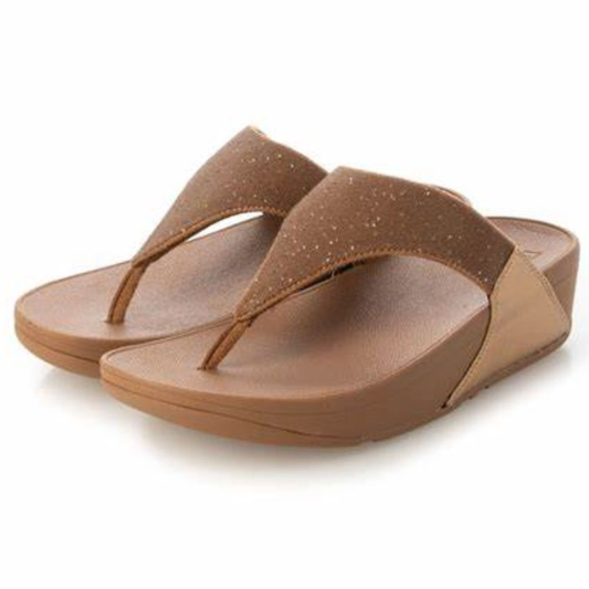 A pair of brown FitFlop Opul Latte sandals isolated on a white background.