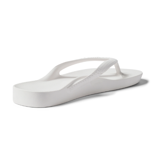 A white ARCHIES FOOTWEAR LLC Archies Flip Flops biomechanically providing support with a flop flop.