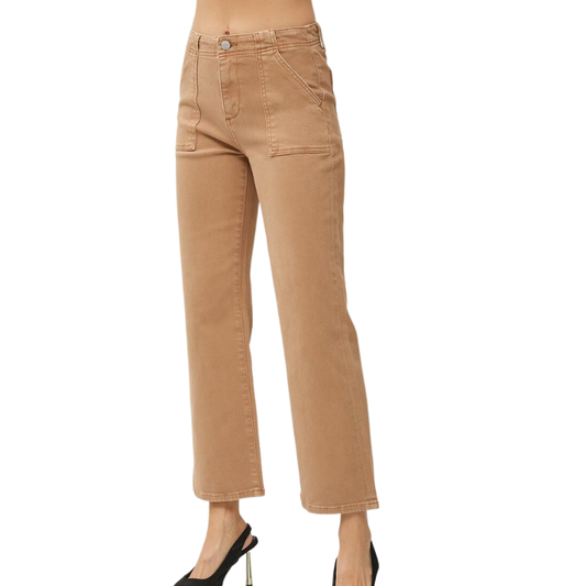 The model is wearing a pair of RISEN HIGH RISE PATCH POCKET ANKLE FLARE PANTS - cocoa with front patch pockets.