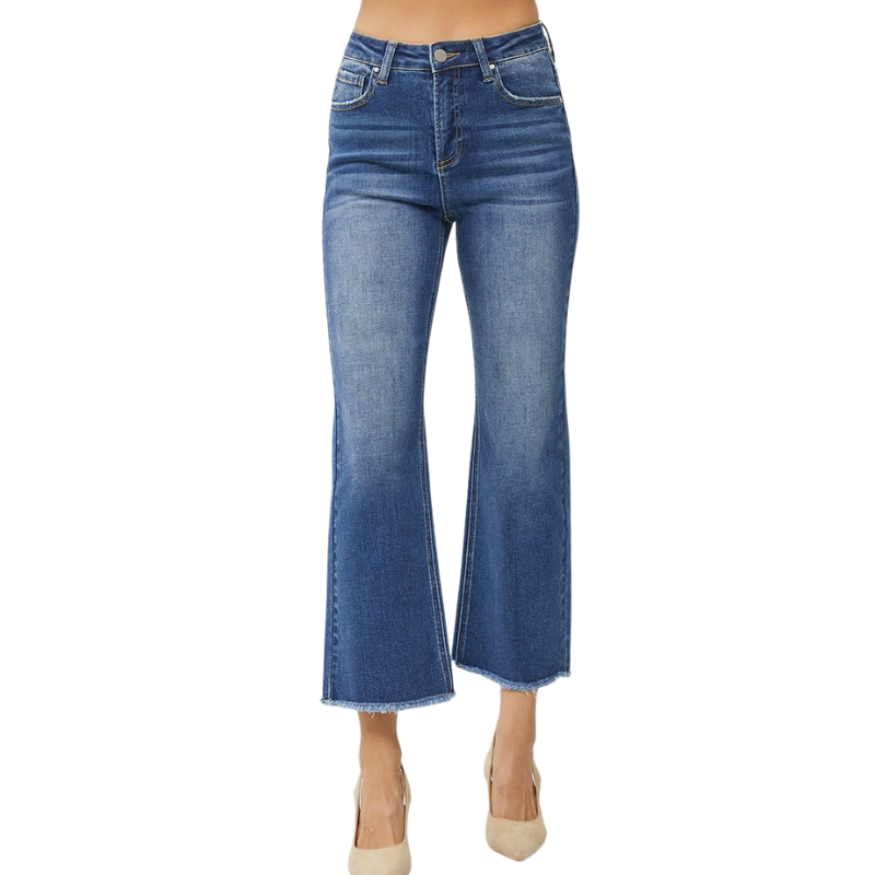 A woman wearing a pair of RISEN HIGH RISE ANKLE WIDE STRAIGHT JEANS - denim made of cotton.