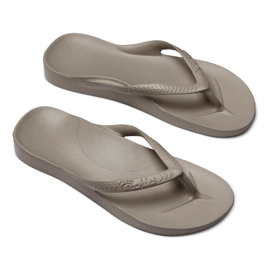 These ARCHIES FLIP FLOPS IN TAUPE from ARCHIES FOOTWEAR LLC offer support and are biomechanically appropriate for the arches.