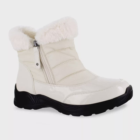 The Frosty Rain and Winter Boot in Winter White by Easy Street features a fur lining, front zipper, and black sole, offering stylish protection during the frosty winter months.